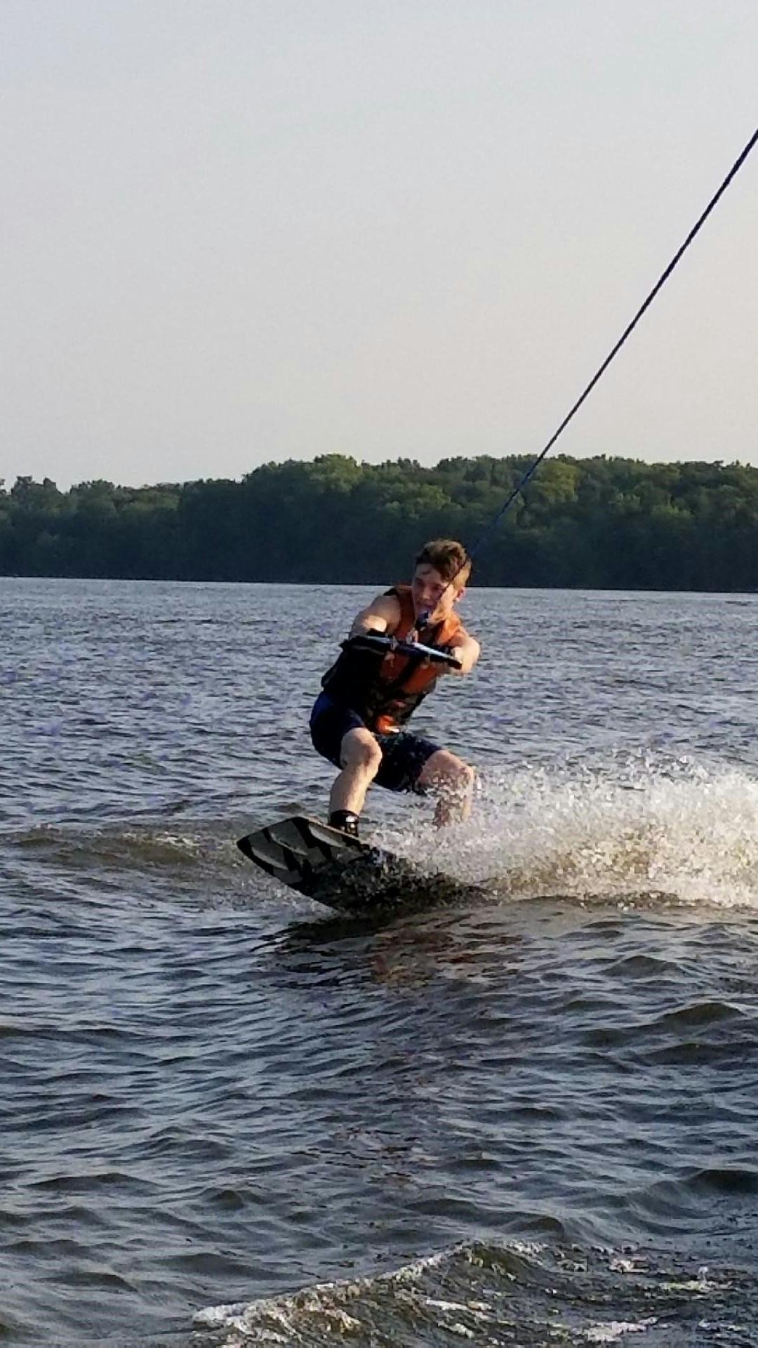 Image of Jordan Ready Wakeboarding on a lake
